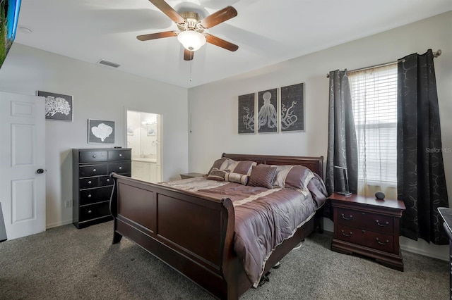 3116 SW 16th Pl, Cape Coral, FL 33914 - carpeted bedroom with connected bathroom and a ceiling fan
