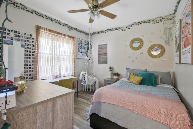 3116 SW 16th Pl, Cape Coral, FL 33914 - bedroom featuring light wood-type flooring and a ceiling fan