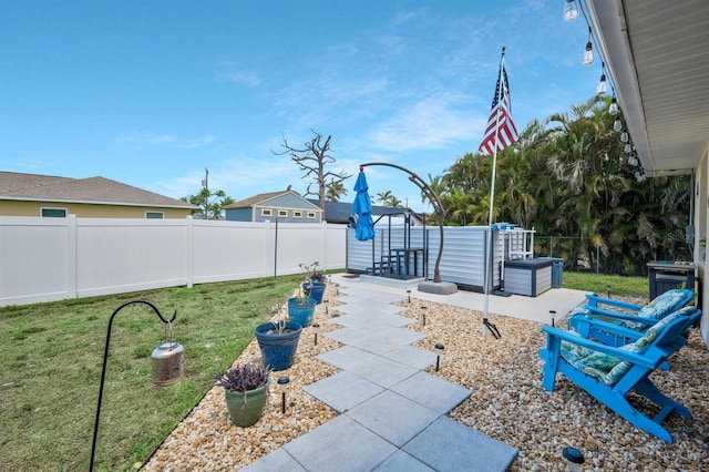 3116 SW 16th Pl, Cape Coral, FL 33914 - fenced backyard featuring a patio