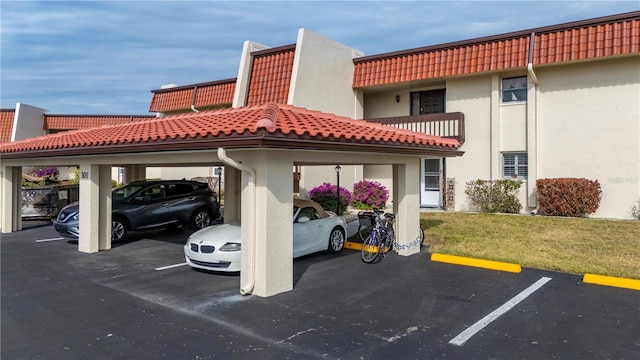 311 Garvin St Unit 301B, Punta Gorda, FL 33950 - view of partially covered parking lot