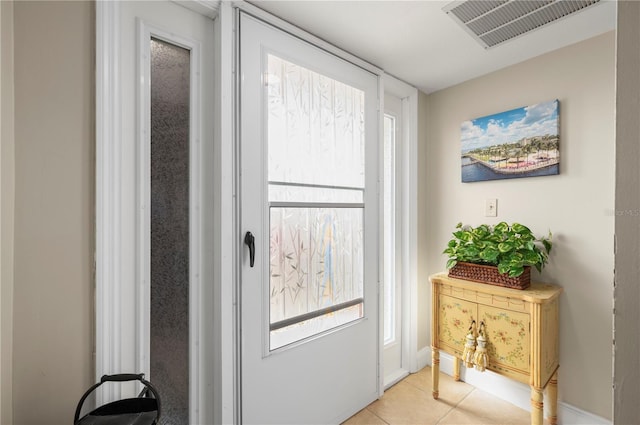 311 Garvin St Unit 301B, Punta Gorda, FL 33950 - doorway with light tile patterned floors