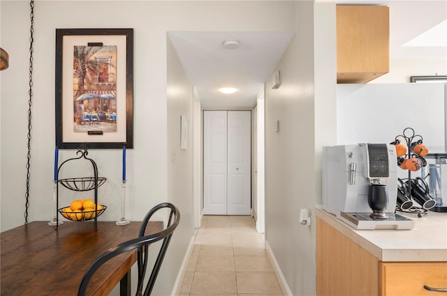 311 Garvin St Unit 301B, Punta Gorda, FL 33950 - hallway featuring light tile patterned floors and baseboards