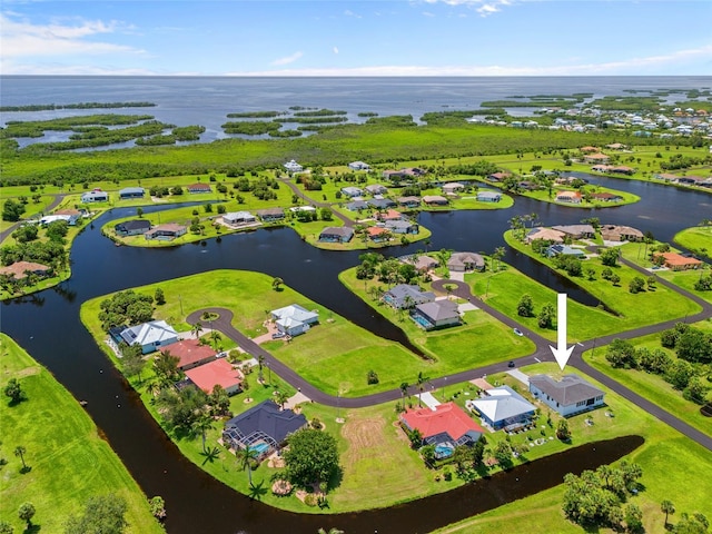 16322 Nogales Ct, Punta Gorda, FL 33955 - aerial perspective of suburban area featuring a large body of water