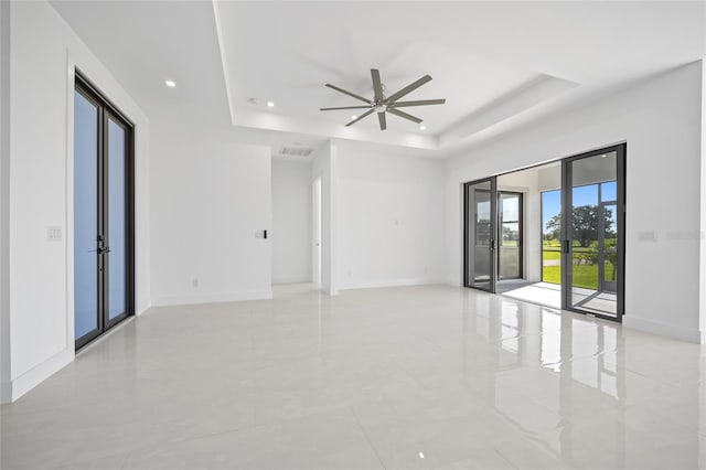 16322 Nogales Ct, Punta Gorda, FL 33955 - spare room with a raised ceiling, a ceiling fan, and recessed lighting