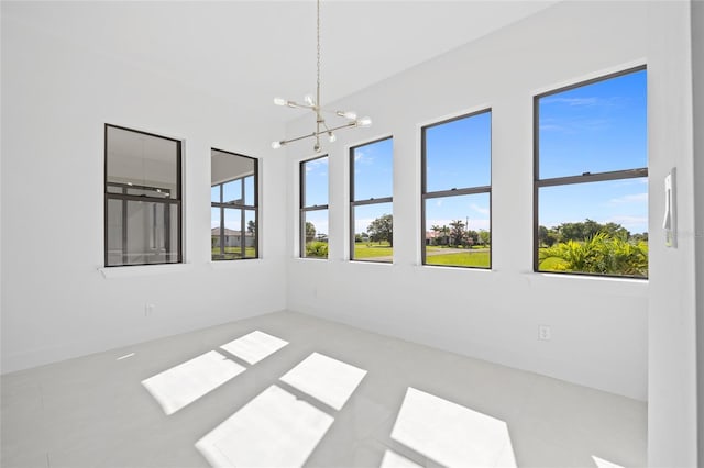 16322 Nogales Ct, Punta Gorda, FL 33955 - spare room featuring healthy amount of natural light and a chandelier