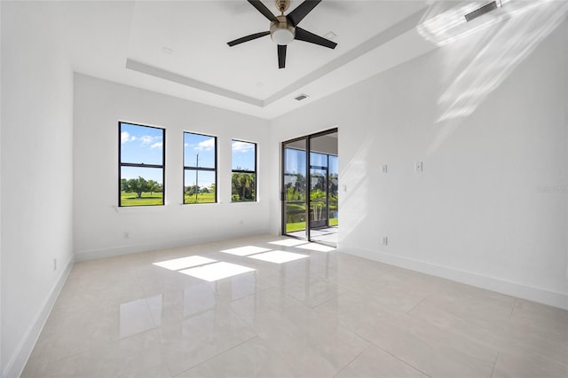 16322 Nogales Ct, Punta Gorda, FL 33955 - spare room with a ceiling fan and a tray ceiling
