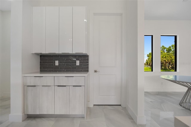 17200 Mint Ln, Punta Gorda, FL 33955 - detailed view of baseboards and tasteful backsplash