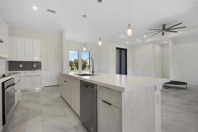 17200 Mint Ln, Punta Gorda, FL 33955 - kitchen with modern cabinets, appliances with stainless steel finishes, decorative backsplash, and recessed lighting