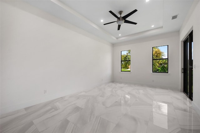 17200 Mint Ln, Punta Gorda, FL 33955 - unfurnished room with recessed lighting, a ceiling fan, and a tray ceiling