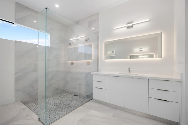17200 Mint Ln, Punta Gorda, FL 33955 - full bath featuring a tile shower, vanity, and marble finish floors