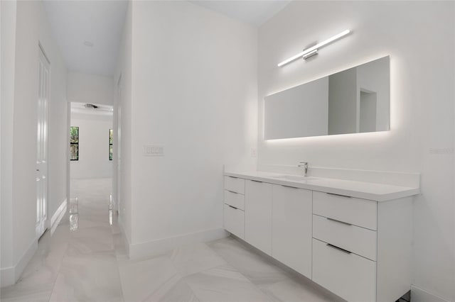 17200 Mint Ln, Punta Gorda, FL 33955 - bathroom featuring vanity and marble look tile flooring