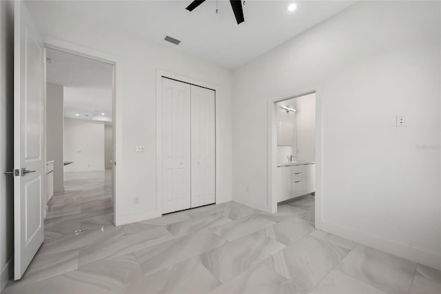 17200 Mint Ln, Punta Gorda, FL 33955 - unfurnished bedroom with a closet, ensuite bathroom, recessed lighting, and a ceiling fan