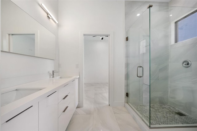 17200 Mint Ln, Punta Gorda, FL 33955 - full bath featuring marble finish flooring, a shower stall, and double vanity