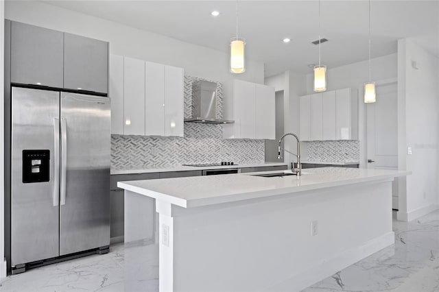 16506 Cape Horn Blvd, Punta Gorda, FL 33955 - kitchen with stainless steel fridge with ice dispenser, wall chimney exhaust hood, light marble finish flooring, modern cabinets, and recessed lighting
