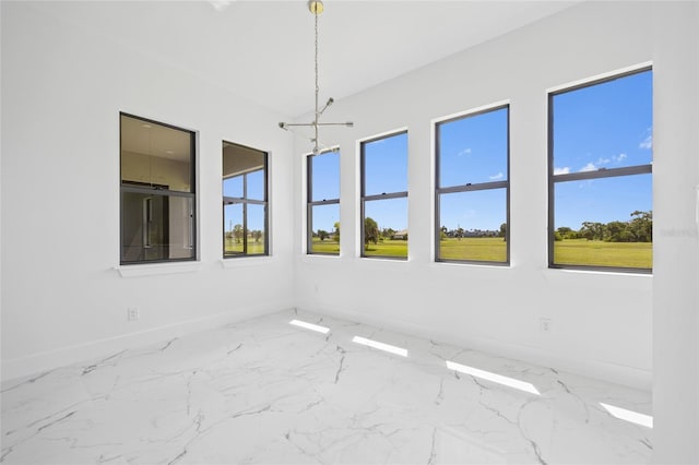 16506 Cape Horn Blvd, Punta Gorda, FL 33955 - spare room with baseboards and a chandelier