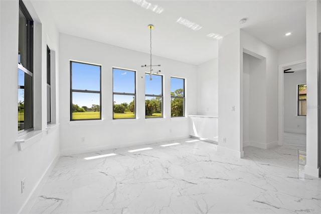 16506 Cape Horn Blvd, Punta Gorda, FL 33955 - unfurnished dining area featuring healthy amount of natural light, a chandelier, marble finish flooring, and recessed lighting