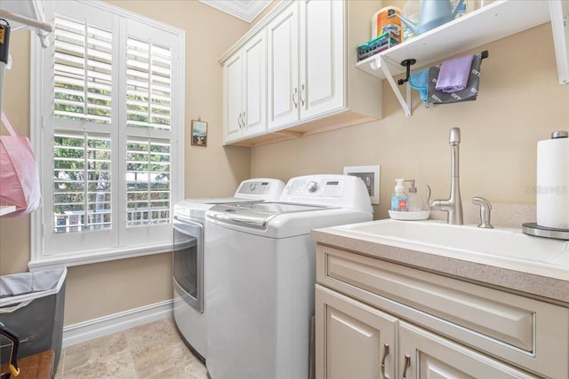 233 Durrance St, Punta Gorda, FL 33950 - laundry room featuring separate washer and dryer and cabinet space