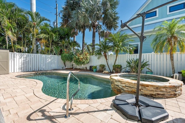 233 Durrance St, Punta Gorda, FL 33950 - view of pool featuring a fenced backyard, a patio, and a pool with connected hot tub