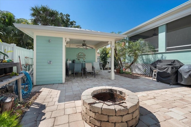233 Durrance St, Punta Gorda, FL 33950 - view of patio / terrace featuring ceiling fan, a fire pit, outdoor dining area, and a grill