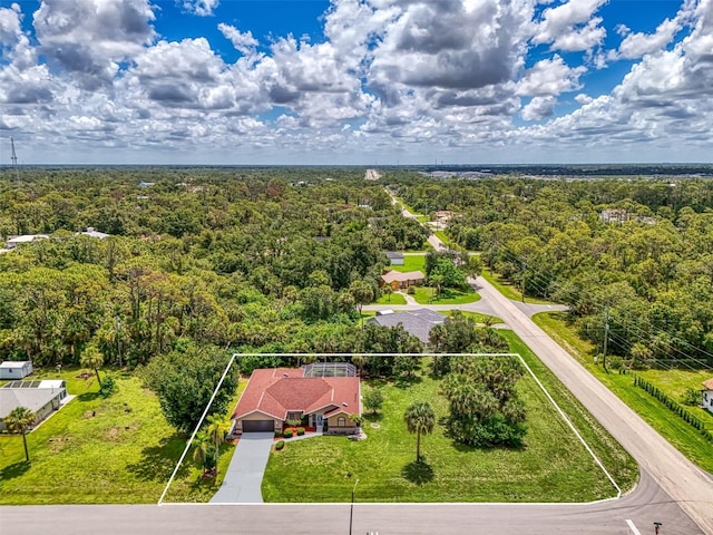 510 Border St, Port Charlotte, FL 33953 - aerial overview of property's location featuring a forest and property parcel outlined