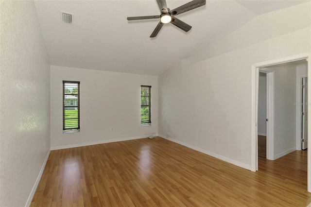 510 Border St, Port Charlotte, FL 33953 - unfurnished room featuring lofted ceiling, light wood-type flooring, and a ceiling fan