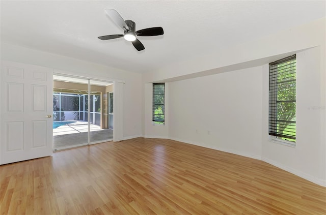 510 Border St, Port Charlotte, FL 33953 - empty room featuring light wood-style floors and ceiling fan
