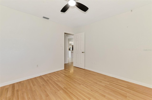 510 Border St, Port Charlotte, FL 33953 - empty room with light wood-type flooring and a ceiling fan