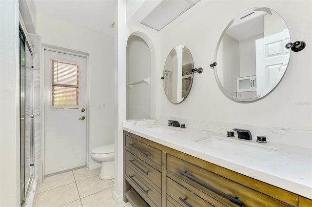 510 Border St, Port Charlotte, FL 33953 - bathroom with double vanity, tile patterned floors, and a shower stall