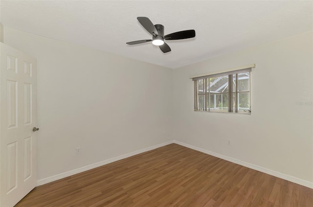 510 Border St, Port Charlotte, FL 33953 - unfurnished room featuring wood finished floors and ceiling fan