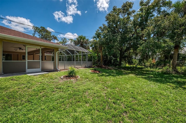 510 Border St, Port Charlotte, FL 33953 - view of green lawn with a lanai and ceiling fan