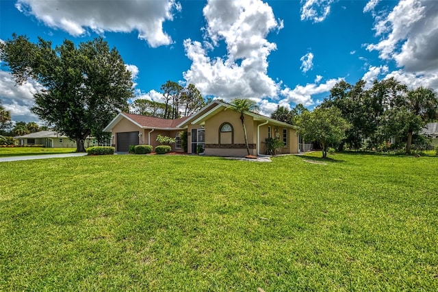 510 Border St, Port Charlotte, FL 33953 - ranch-style home with driveway, an attached garage, stucco siding, and a front lawn