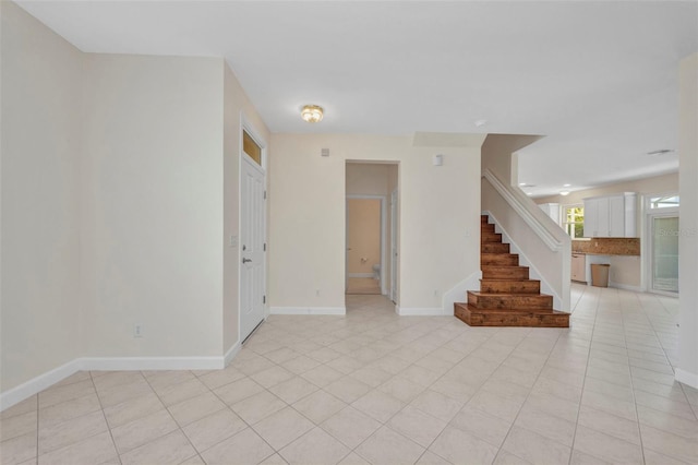 200 Valdiva St, Punta Gorda, FL 33983 - empty room featuring stairway and light tile patterned flooring