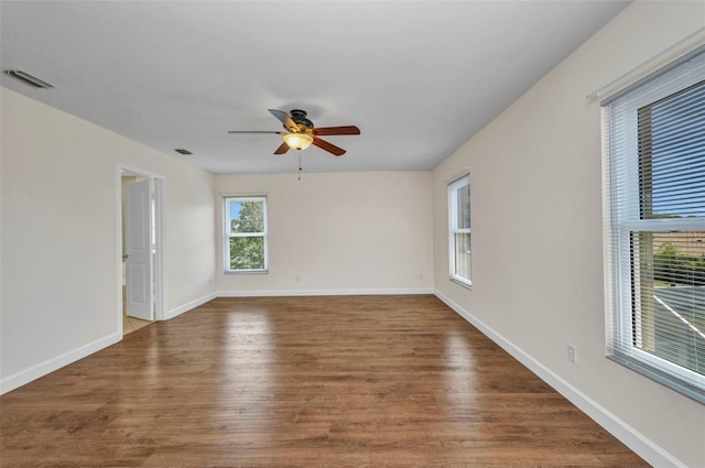 200 Valdiva St, Punta Gorda, FL 33983 - empty room featuring a ceiling fan and wood finished floors
