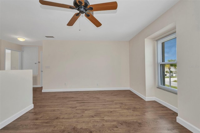 200 Valdiva St, Punta Gorda, FL 33983 - empty room with wood finished floors and a ceiling fan
