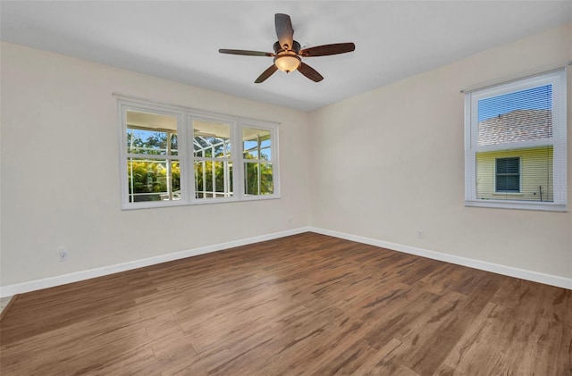 200 Valdiva St, Punta Gorda, FL 33983 - empty room with wood finished floors and a ceiling fan