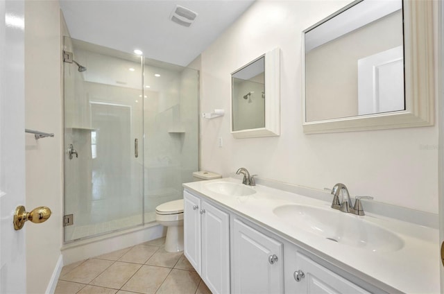 200 Valdiva St, Punta Gorda, FL 33983 - bathroom featuring a shower stall, tile patterned floors, double vanity, and recessed lighting