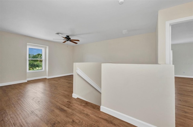 200 Valdiva St, Punta Gorda, FL 33983 - empty room featuring wood finished floors, ceiling fan, and a smoke detector