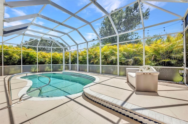200 Valdiva St, Punta Gorda, FL 33983 - outdoor pool featuring a patio area and glass enclosure