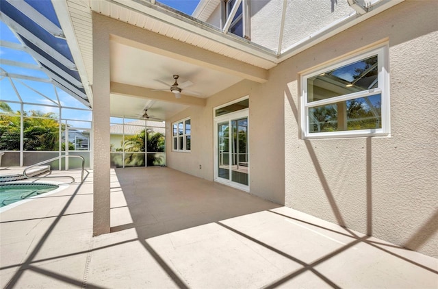200 Valdiva St, Punta Gorda, FL 33983 - view of patio featuring a ceiling fan, an outdoor pool, and glass enclosure