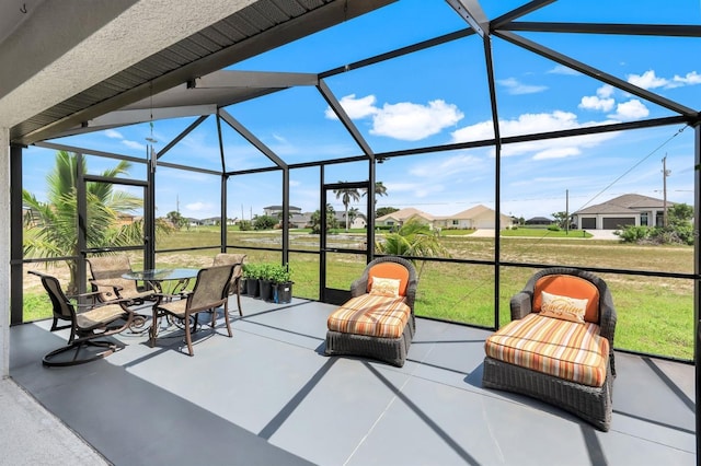 4321 NW 34th Ln, Cape Coral, FL 33993 - view of patio / terrace with glass enclosure, a residential view, and outdoor dining area