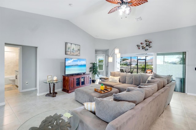 4321 NW 34th Ln, Cape Coral, FL 33993 - living room with light tile patterned flooring, a ceiling fan, and vaulted ceiling