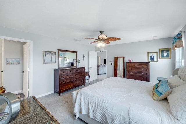 4321 NW 34th Ln, Cape Coral, FL 33993 - carpeted bedroom with ceiling fan and baseboards