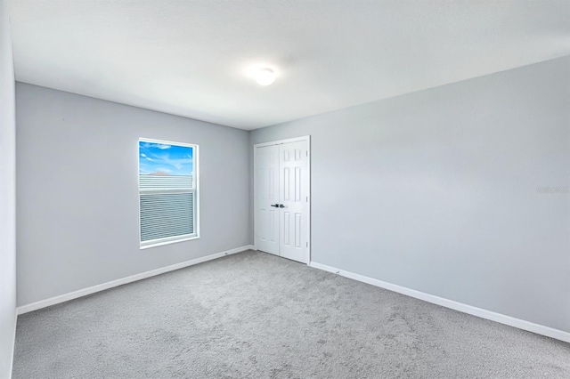 4321 NW 34th Ln, Cape Coral, FL 33993 - carpeted spare room with baseboards