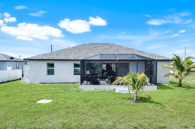 4321 NW 34th Ln, Cape Coral, FL 33993 - back of property with stucco siding, a shingled roof, glass enclosure, and a patio area