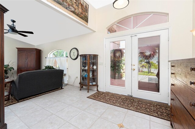 4142 Reif Ct, Port Charlotte, FL 33981 - entrance foyer featuring french doors, light tile patterned floors, vaulted ceiling, and a ceiling fan