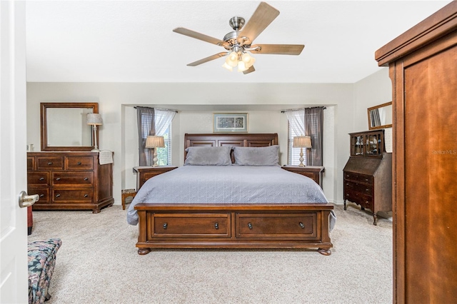 4142 Reif Ct, Port Charlotte, FL 33981 - bedroom with light carpet, multiple windows, and ceiling fan