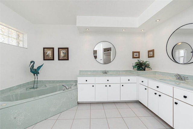 4142 Reif Ct, Port Charlotte, FL 33981 - bathroom with double vanity, recessed lighting, a bath, and tile patterned flooring