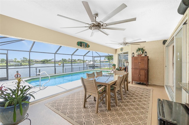 4142 Reif Ct, Port Charlotte, FL 33981 - outdoor pool featuring ceiling fan, a patio area, a water view, and glass enclosure