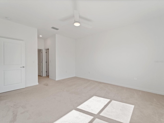 2161 Gardenia Ave, Port Charlotte, FL 33953 - spare room with light colored carpet and ceiling fan
