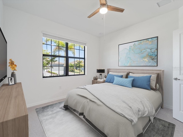 2161 Gardenia Ave, Port Charlotte, FL 33953 - bedroom with light carpet and a ceiling fan